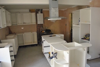 New kitchen units being fitted in worcester